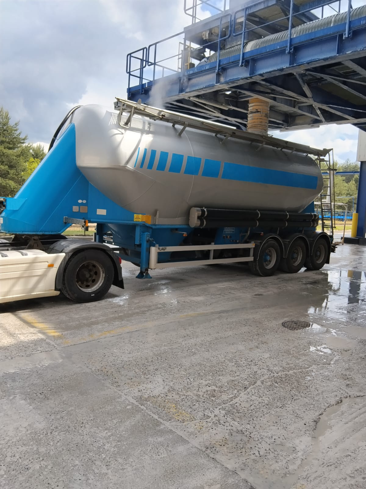Truck positioned at a loading facility.