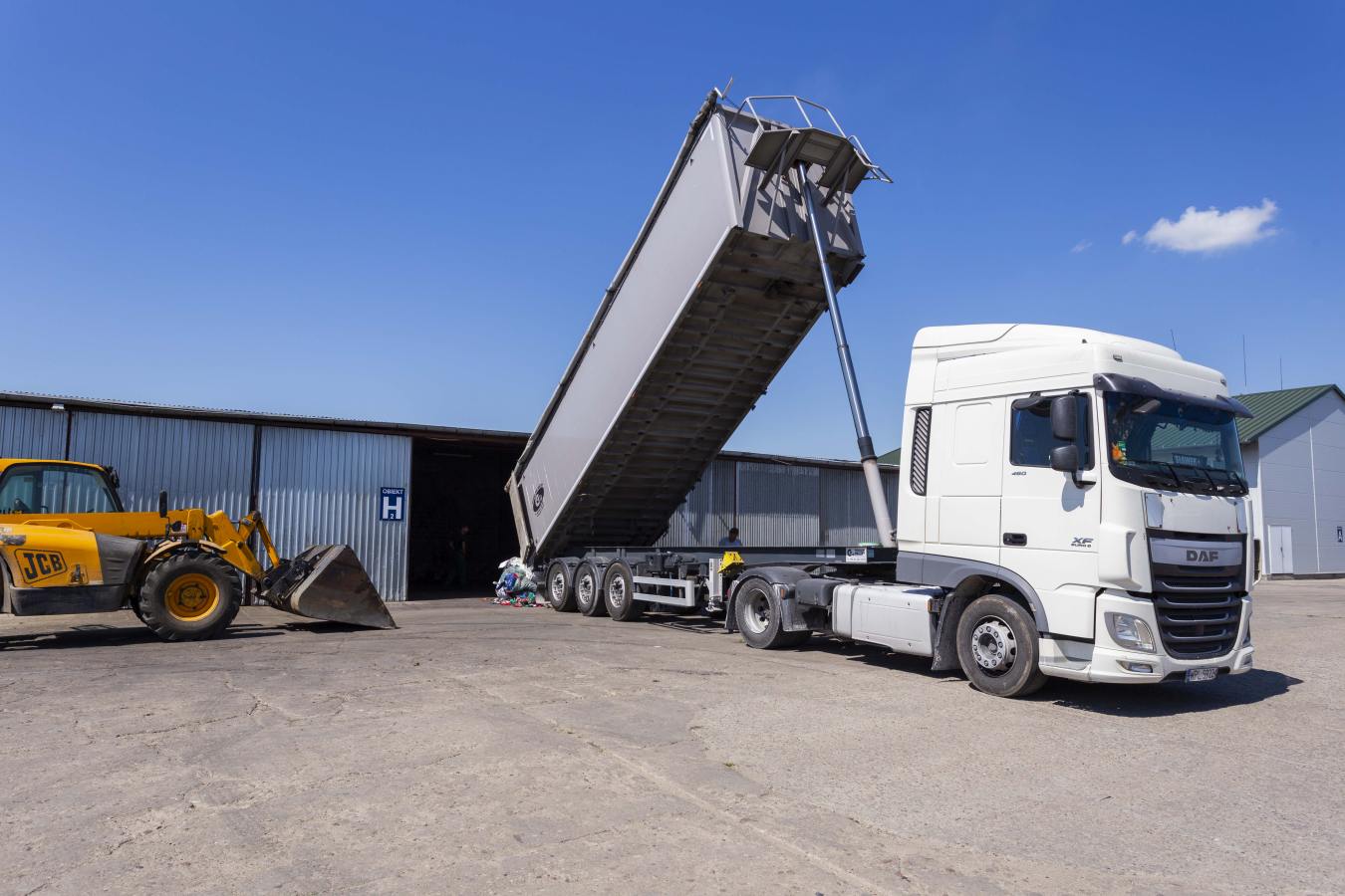 Truck positioned at a loading facility.